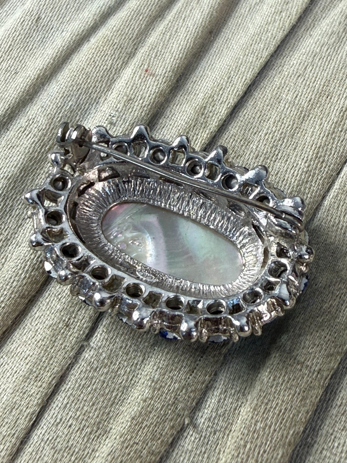 Vintage Sparkly Sphinx Brooch Pin Mother of Pearl Silver Tone Blue AB Rhinestone