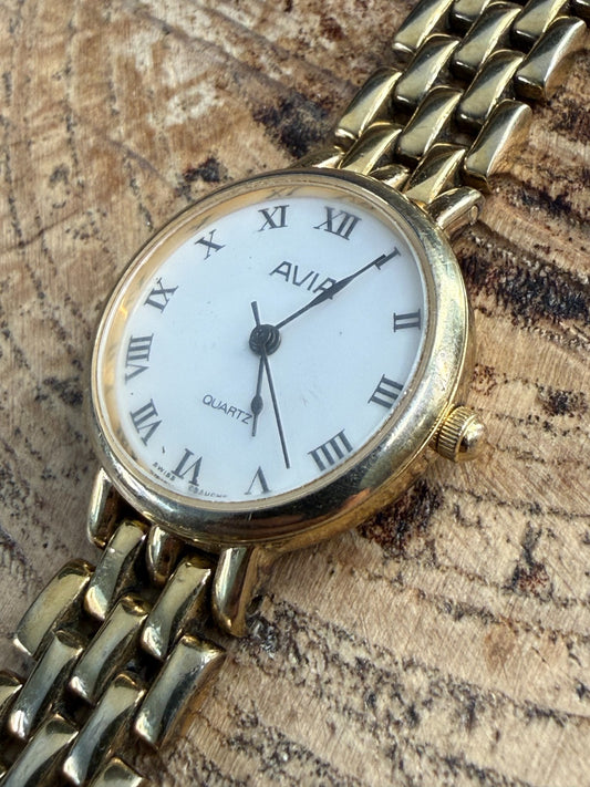 Vintage Avia Ladies Quartz Watch Gold Tone White Roman Numeral Dial Swiss Ebauch