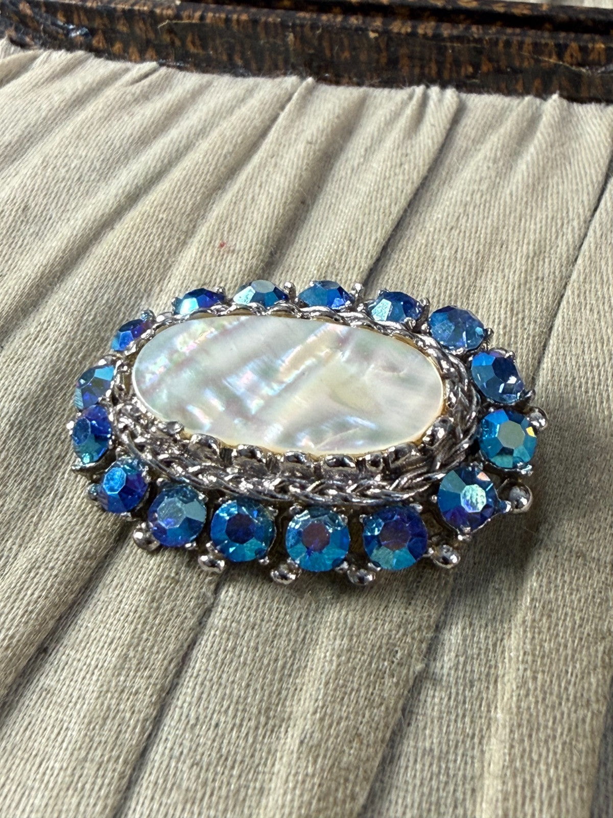 Vintage Sparkly Sphinx Brooch Pin Mother of Pearl Silver Tone Blue AB Rhinestone