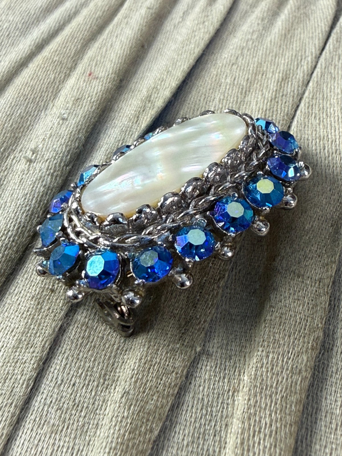 Vintage Sparkly Sphinx Brooch Pin Mother of Pearl Silver Tone Blue AB Rhinestone