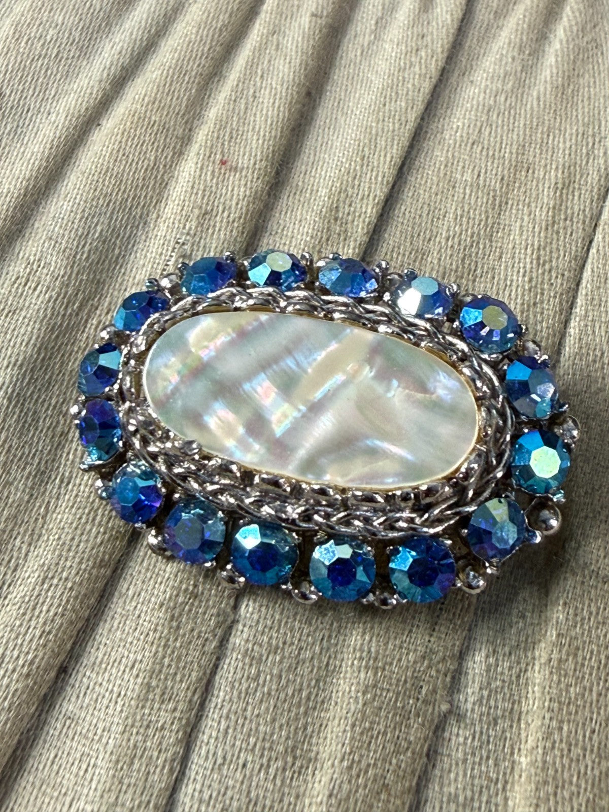 Vintage Sparkly Sphinx Brooch Pin Mother of Pearl Silver Tone Blue AB Rhinestone