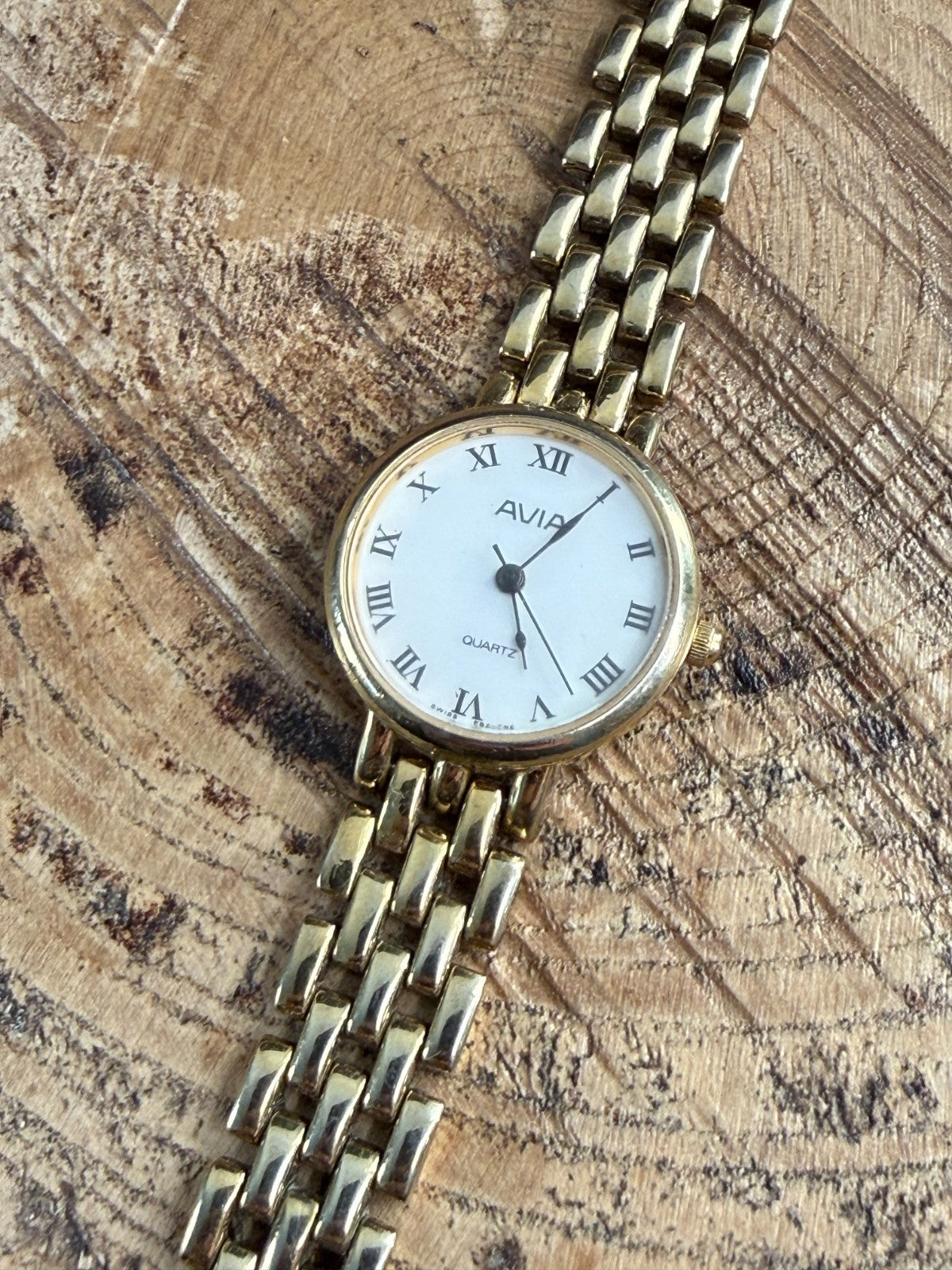 Vintage Avia Ladies Quartz Watch Gold Tone White Roman Numeral Dial Swiss Ebauch