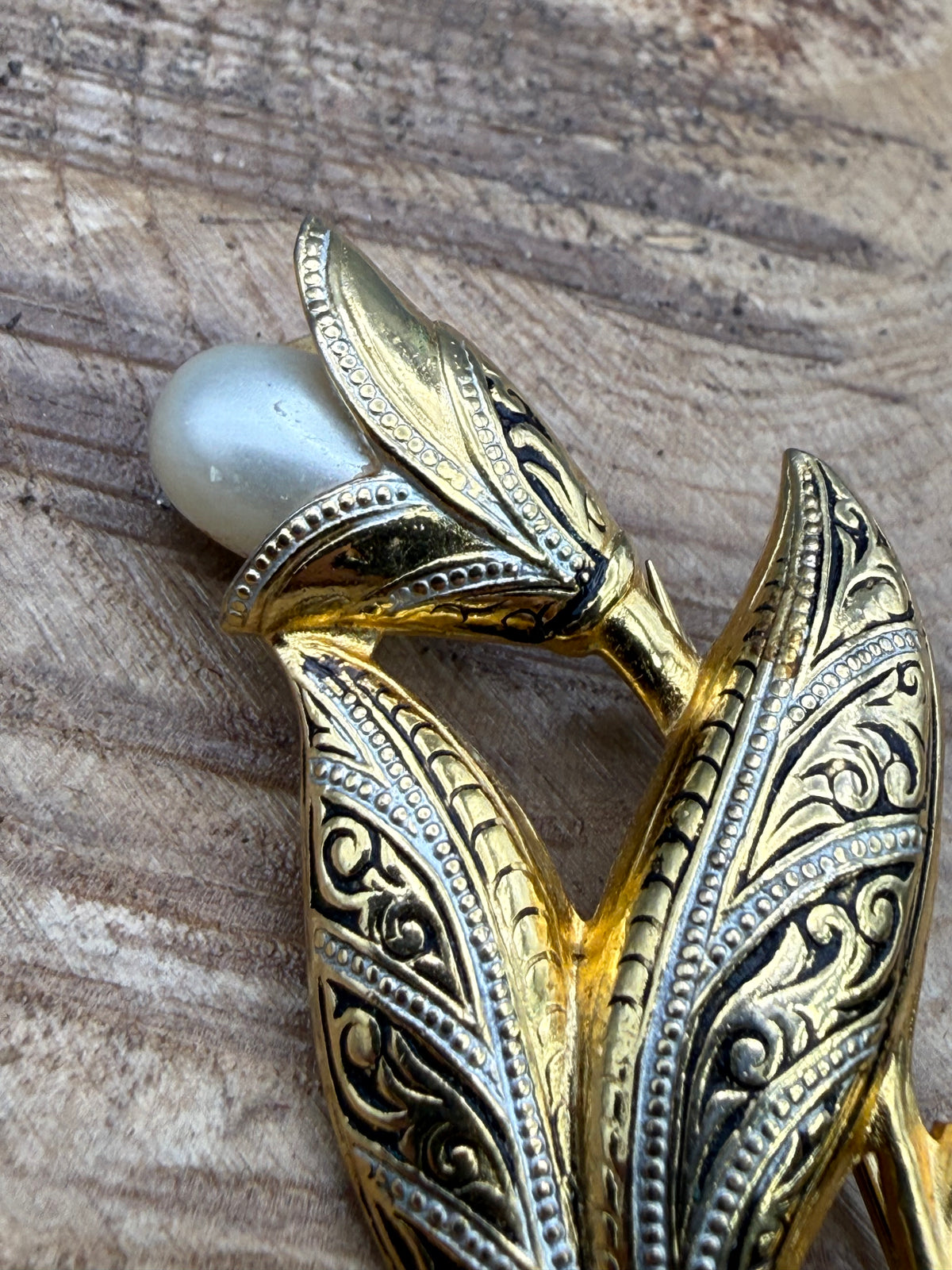 Damascene Style Flower Brooch with Black Scrollwork and Faux Pearl