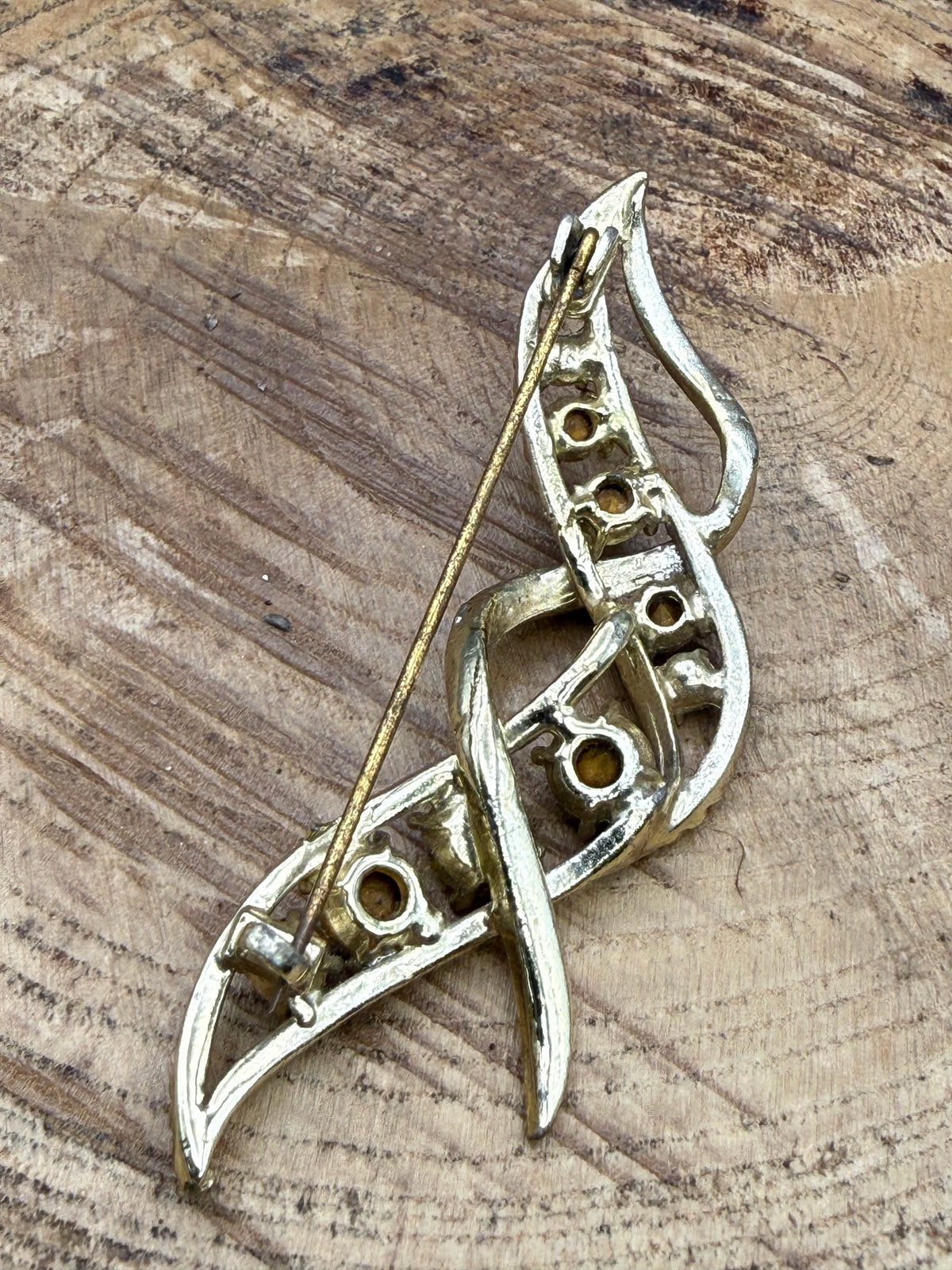 Vintage Ribbon Twist Brooch with Graduated Blue Rhinestones