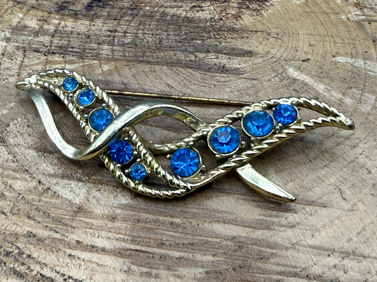 Vintage Ribbon Twist Brooch with Graduated Blue Rhinestones
