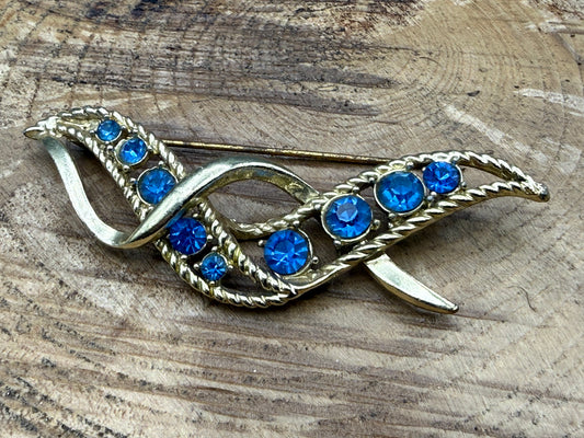 Vintage Ribbon Twist Brooch with Graduated Blue Rhinestones