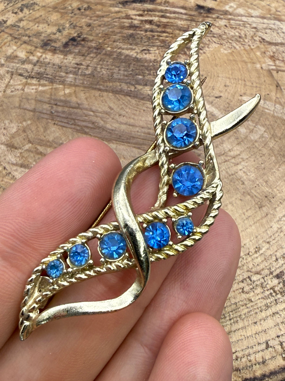 Vintage Ribbon Twist Brooch with Graduated Blue Rhinestones
