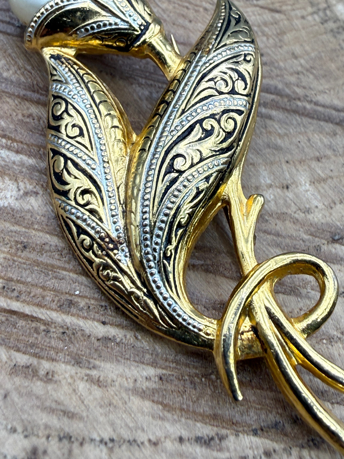 Damascene Style Flower Brooch with Black Scrollwork and Faux Pearl