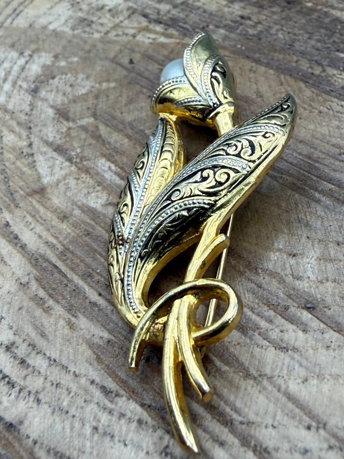 Damascene Style Flower Brooch with Black Scrollwork and Faux Pearl