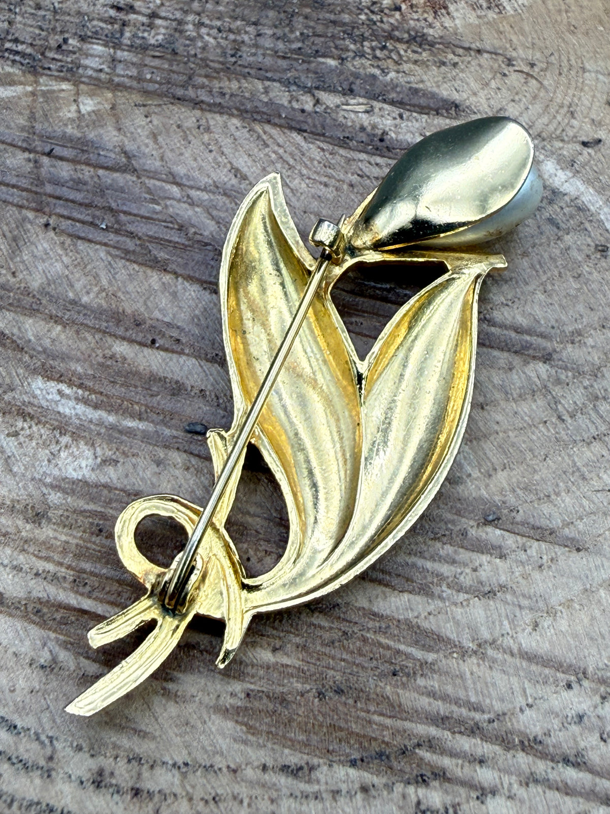 Damascene Style Flower Brooch with Black Scrollwork and Faux Pearl